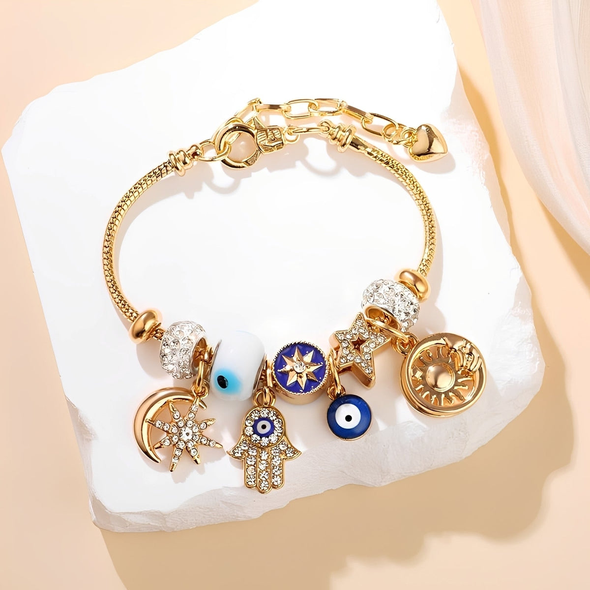 Charm-Armband für Damen mit Hamsa-Hand, bösem Auge und himmlischen Anhängern