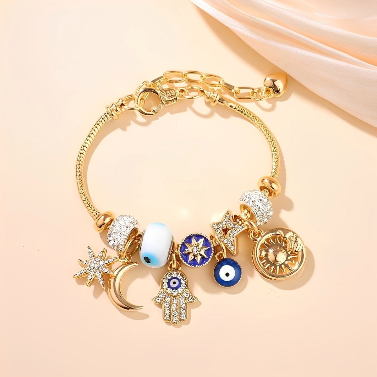 Charm-Armband für Damen mit Hamsa-Hand, bösem Auge und himmlischen Anhängern