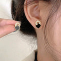 Geometrische Ohrstecker - Ohrringe mit schwarzen Zirkonia