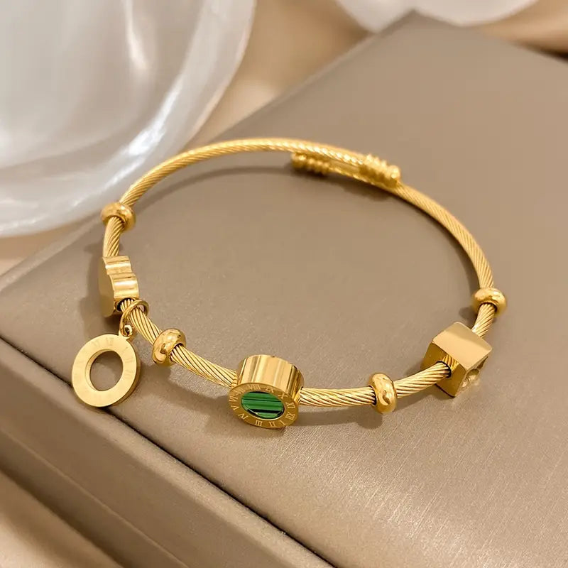Rhian – Armband in Gold mit Signatur