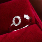 Nova – Moderner Offener Ring mit Initiale und Zirkonia