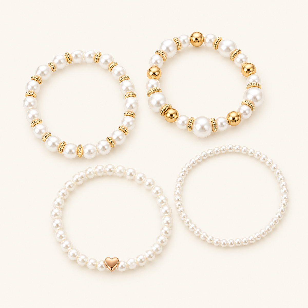 Damen 4-teiliges stapelbares Armband-Set mit Perlendetails und Herzanhänger