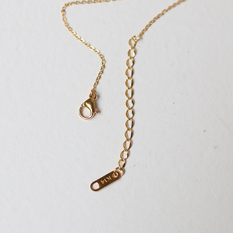 Nelly – Kette Minimalistisches Kreuz Gold