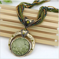 Raya – Goldene Kette mit Grünem Anhänger