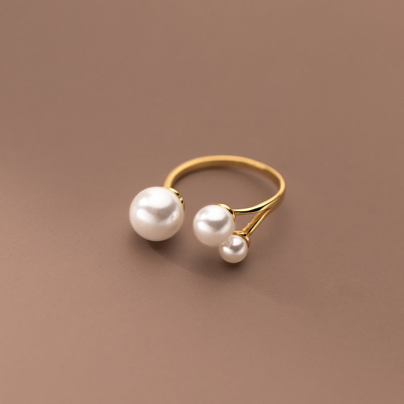 Clara – Anpassbarer Ring mit Süßwasserperle und Dreiecksform