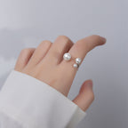 Clara – Anpassbarer Ring mit Süßwasserperle und Dreiecksform