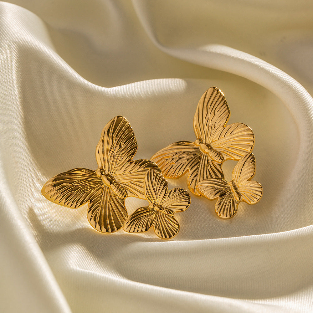Mariah - Goldene Ohrringe mit Schmetterlingsdesign