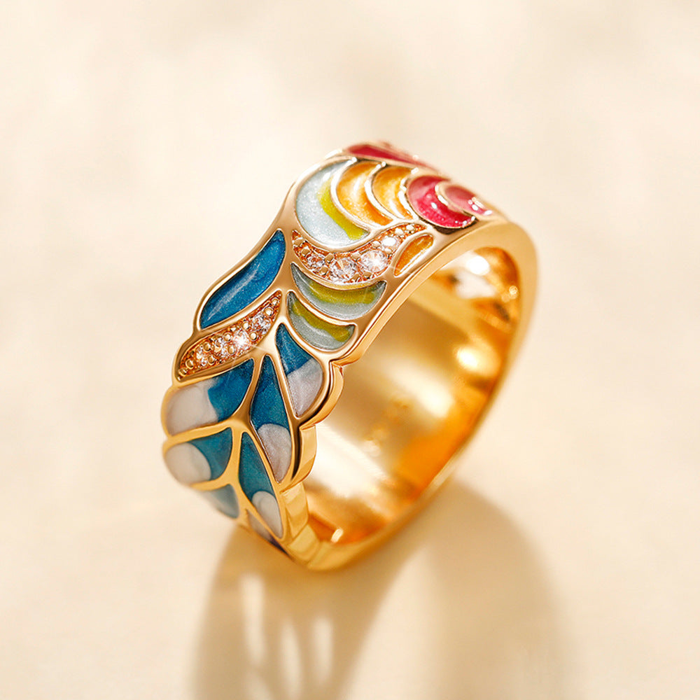 Margaux – Ring mit Goldmotiv und blau-weißem Design