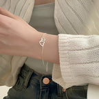 Amara – Glücksbringer-Armband mit Doppelherz