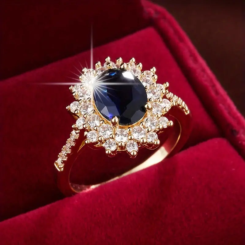 Delphine – Goldener Chic-Ring mit Blauem Stein