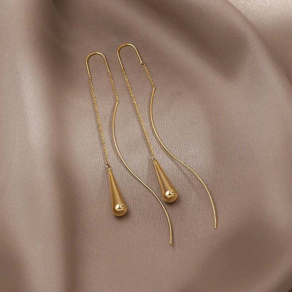 Amaris – Ohrringe mit goldenen Tropfen und Quasten