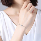 Thalassa – Silbernes Armband mit Blauem Schutzauge