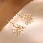 Xienna – Glitzernde Goldene Stern Ohrringe