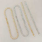 Victoria – Kette und Armband mit schimmerndem Rundknopf
