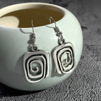 Kaia – Ohrringe im Boho-Stil in Silber mit Spiralform