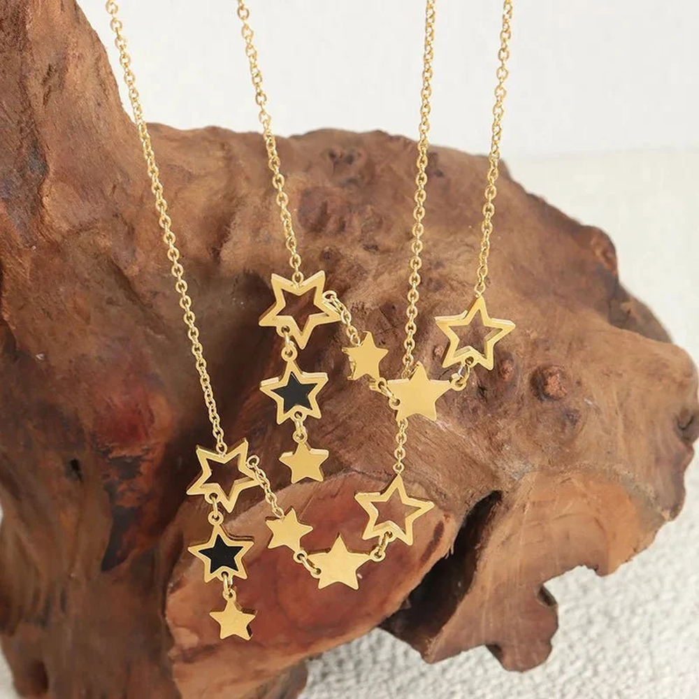 Damen Stern-Halskette mit verschiedenen Anhängern und asymmetrischem Sterndesign